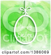 Poster, Art Print Of Happy Easter Greeting In A Suspended Egg Over Green Watercolor