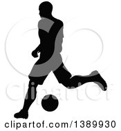 Poster, Art Print Of Black Silhouetted Male Soccer Player In Action