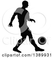 Poster, Art Print Of Black Silhouetted Male Soccer Player In Action