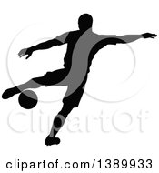 Poster, Art Print Of Black Silhouetted Male Soccer Player In Action