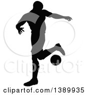 Poster, Art Print Of Black Silhouetted Male Soccer Player In Action