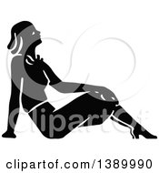 Clipart Of A Vintage Black And White Woman Sitting On The Floor Royalty Free Vector Illustration