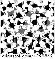 Clipart Of A Seamless Background Pattern Of Black Trophies Royalty Free Vector Illustration