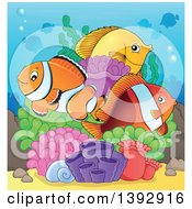 Clipart Of Clownfish And Yellow Tang Marine Fish At A Reef Royalty Free Vector Illustration
