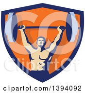 Clipart Of A Retro Male Bodybuilder Holding A Heavy Barbell Over His Head Inside A Blue And Orange Shield Royalty Free Vector Illustration