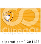 Clipart Of A Rear View Of A Cartoon White Male Golfer Swinging And Orange Rays Background Or Business Card Design Royalty Free Illustration