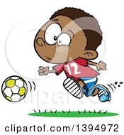 Poster, Art Print Of Cartoon Black Boy Playing Soccer