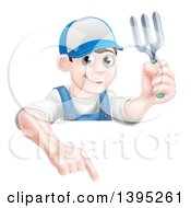 Poster, Art Print Of Young Brunette White Male Gardener In Blue Holding A Garden Fork And Pointing Down Over A Sign