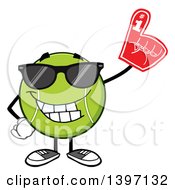 Cartoon Happy Tennis Ball Character Mascot Wearing Sunglasses And A Foam Finger