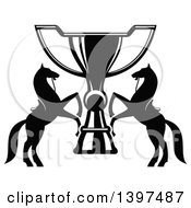 Clipart Of Black And White Silhouetted Rearing Horses Over A Giant Trophy Royalty Free Vector Illustration