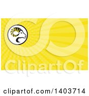Clipart Of A Retro Profiled Dall Sheep Ram Head With Curling Horns And Yellow Rays Background Or Business Card Design Royalty Free Illustration