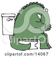 Green Dino Covering His Mouth Or Nose While Sitting On A Toilet