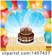 Chocolate Birthday Cake In A Border Of Party Balloons And A Bunting