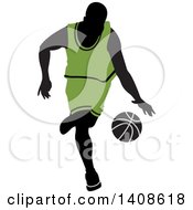 Poster, Art Print Of Black Silhouetted Male Basketball Player In A Green Uniform Dribbling The Ball