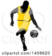 Poster, Art Print Of Black Silhouetted Male Basketball Player In A Yellow Uniform Dribbling The Ball