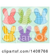 Clipart Of Patterned Rabbit Head Patches On Green Royalty Free Vector Illustration