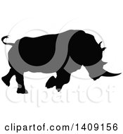 Clipart Of A Black Silhouetted Rhinoceros Charging Royalty Free Vector Illustration