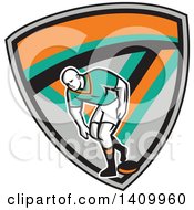 Clipart Of A Retro Male Rugby Player In A Gray Turquoise Black And Orange Shield Royalty Free Vector Illustration