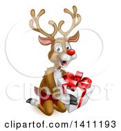 Poster, Art Print Of Happy Rudolph Red Nosed Reindeer Kneeling And Holding A Gift