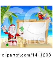 Poster, Art Print Of Christmas Santa Claus Waving And Making A Sand Castle On A Tropical Beach By A Blank White Sign With A Parrot