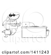 Cartoon Black And White Lineart Business Shark Mascot Character Wearing Sunglasses And Giving A Thumb Up By An Office Desk