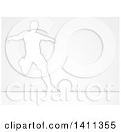 Clipart Of A Silhouetted Male Soccer Football Player About To Kick The Ball Over Gray Royalty Free Vector Illustration