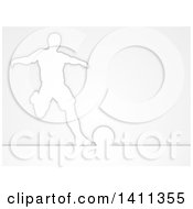 Poster, Art Print Of Silhouetted Male Soccer Football Player About To Kick The Ball Over Gray