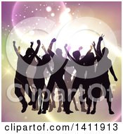 Poster, Art Print Of Group Of Silhouetted People Dancing Over Lights