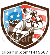 Clipart Of A Retro Male Welder Looking Back Over His Shoulder In An American Shield Royalty Free Vector Illustration