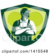 Poster, Art Print Of Retro Male Farmer With Folded Arms Looking To The Side In A Green Shield