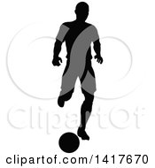 Poster, Art Print Of Black Silhouetted Male Soccer Player In Action