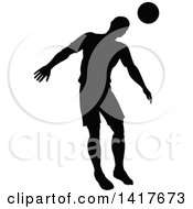 Poster, Art Print Of Black Silhouetted Male Soccer Player In Action