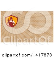 Clipart Of A Retro Male Farmer Or Worker Standing With One Hand In His Pocket And One Hand Holding A Pitchfork And Brown Rays Background Or Business Card Design Royalty Free Illustration