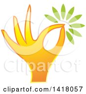 Clipart Of A Hand Holding A Flower Or Leaves Royalty Free Vector Illustration