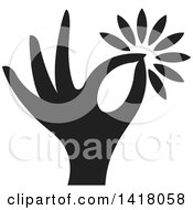 Poster, Art Print Of Black Hand Holding A Flower