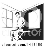Poster, Art Print Of Black And White Man Ironing Clothes