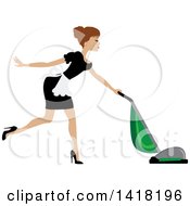 Brunette Female Maid With Her Hair In A Bun Vacuuming