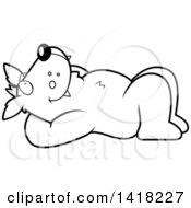 Cartoon Clipart Of A Black And White Lineart Relaxed Wolf Resting On His Back And Stargazing Royalty Free Vector Illustration