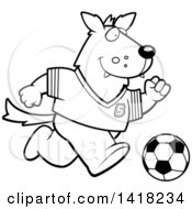 Cartoon Clipart Of A Black And White Lineart Sporty Wolf Playing Soccer Royalty Free Vector Illustration