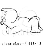 Cartoon Clipart Of A Black And White Lineart Relaxed Rhino Resting On His Back And Stargazing Royalty Free Vector Illustration