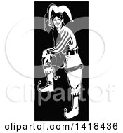 Clipart Of A Black And White Jester Joker Resting A Foot On An Invisible Object Royalty Free Vector Illustration by Frisko