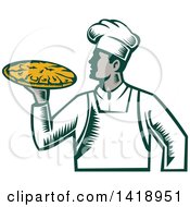 Retro Woodcut Male Chef Holding A Pizza Pie