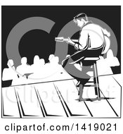 Poster, Art Print Of Black And White Male Musician Playing A Guitar On Stage