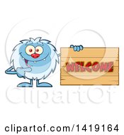 Clipart Of A Cartoon Yeti Abominable Snowman Pointing To A Welcome Sign Royalty Free Vector Illustration