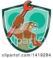 Poster, Art Print Of Retro Hawk Mechanic Man Wearing Overalls And Holding Up A Spanner Wrench In A Green White And Turquoise Shield