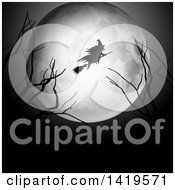 Poster, Art Print Of Silhouetted Witch Flying On A Broomstick Over A Full Moon With Bare Branches