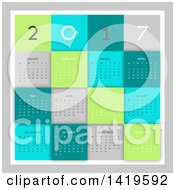 Clipart Of A Block Styled 2017 Year Calendar Over Gray Royalty Free Vector Illustration by KJ Pargeter