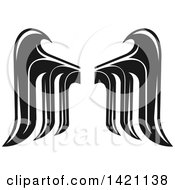 Clipart Of A Pair Of Black And White Feathered Wings Royalty Free Vector Illustration by Vector Tradition SM