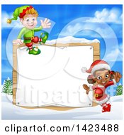 Poster, Art Print Of Happy Christmas Elves By A Wooden Sign In A Winter Landscape
