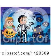 Poster, Art Print Of Boy And Girl Trick Or Treating In Pumpkin And Skeleton Witch Costumes Standing Against A Full Moon Near A Haunted House